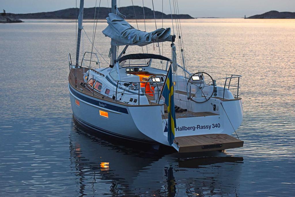 hallberg-rassy-340-anchored-aft-view-blue-hour.jpg