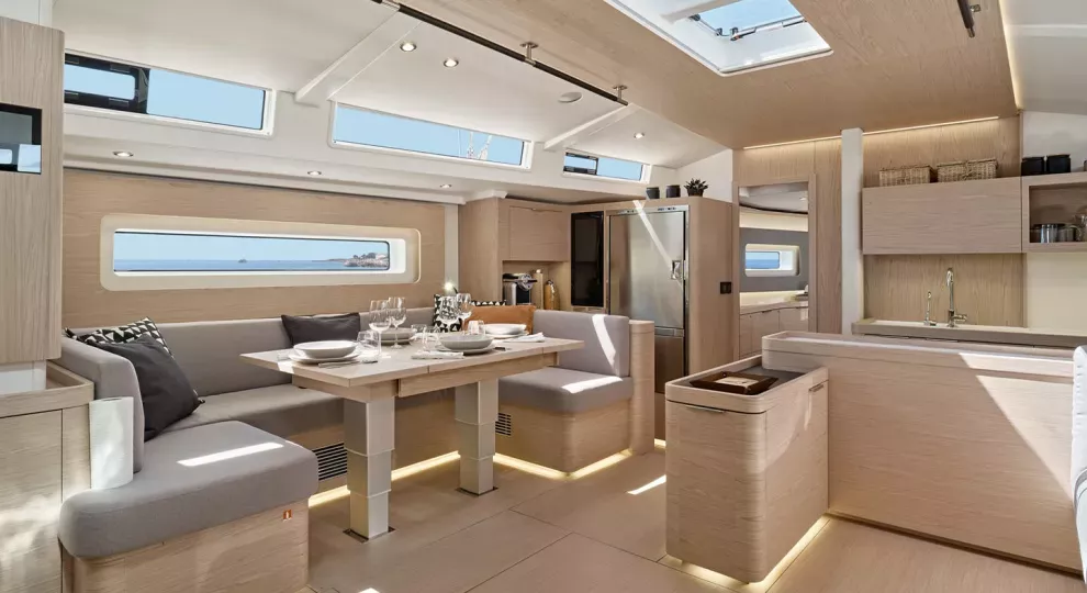 beneteau-oceanis-yacht-60-interior-salon-dining-area.jpg